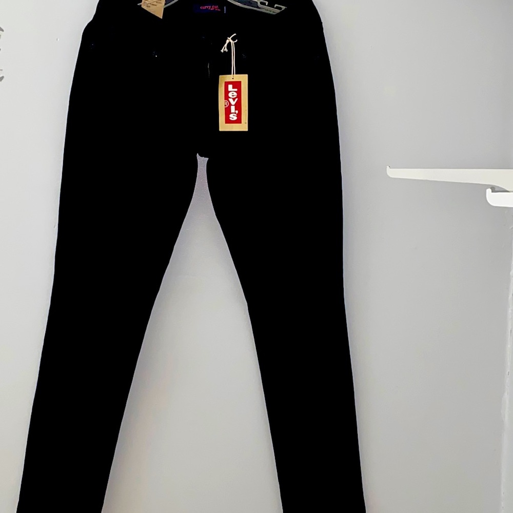 Levi’s skinny stretch denim. Curved cut. Low in front. High back rise.